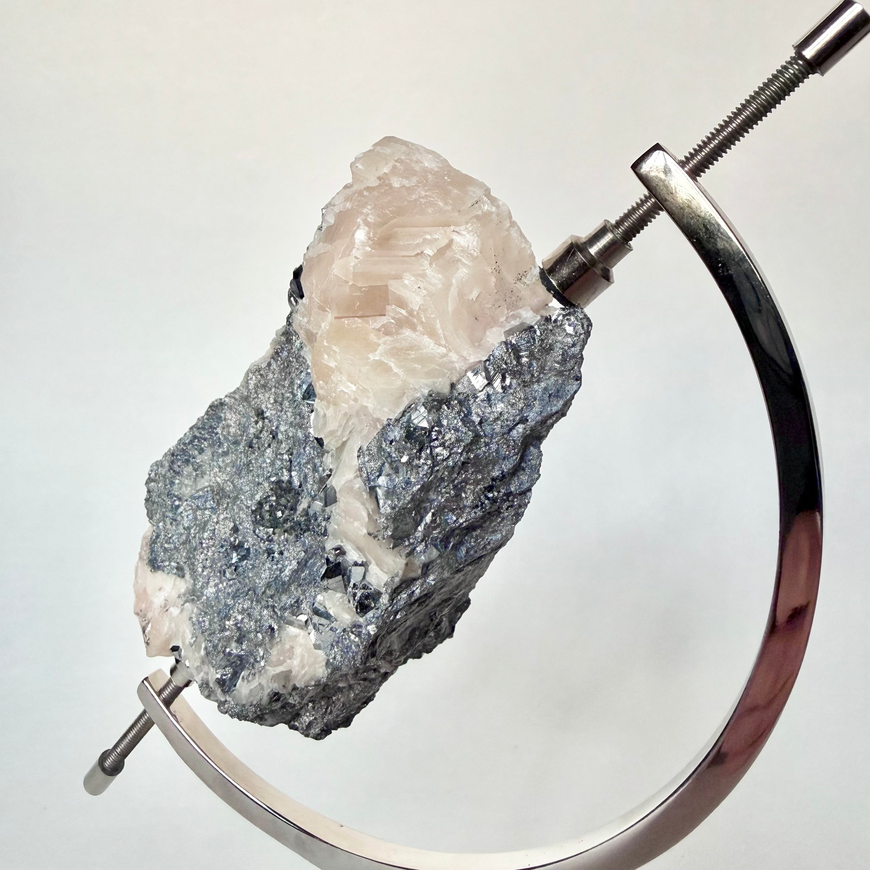 Skutterudite | Blush Calcite + Chrome Arc Stand