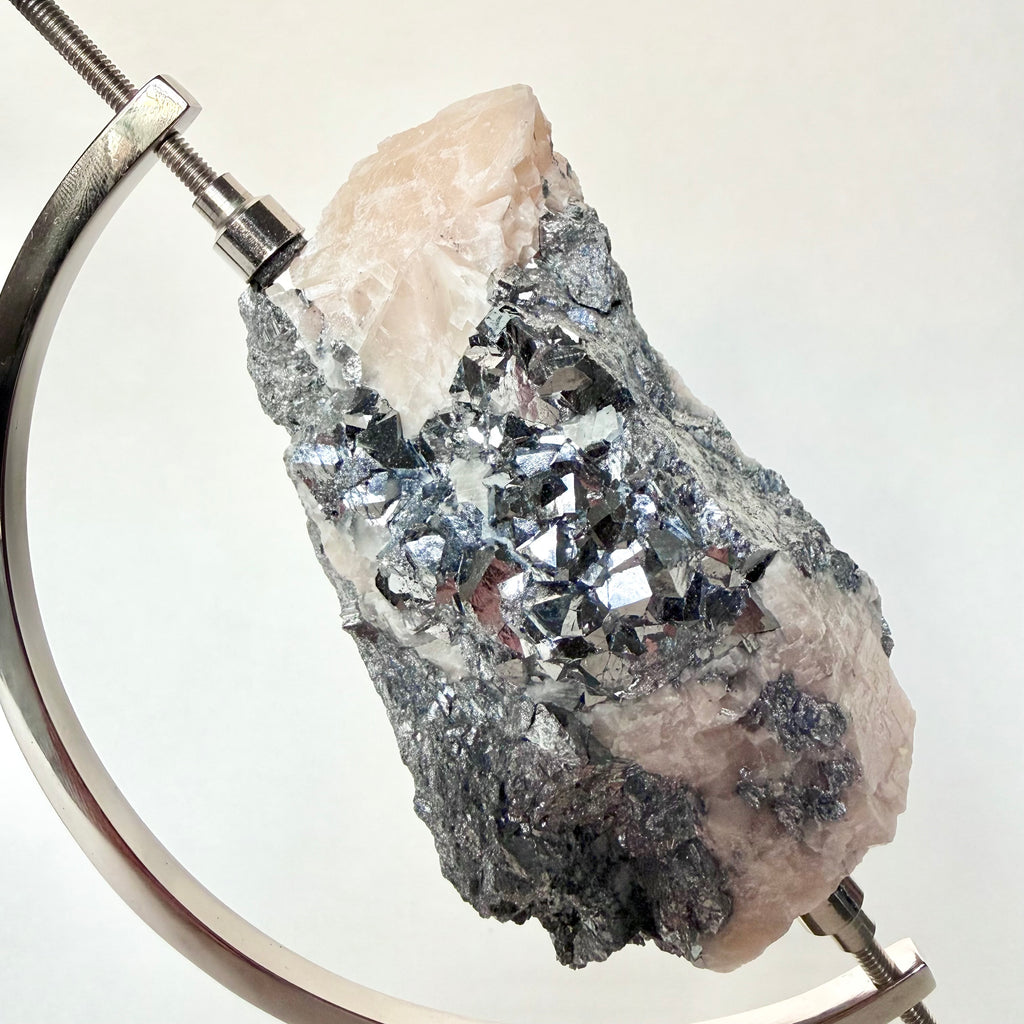 Skutterudite | Blush Calcite + Chrome Arc Stand