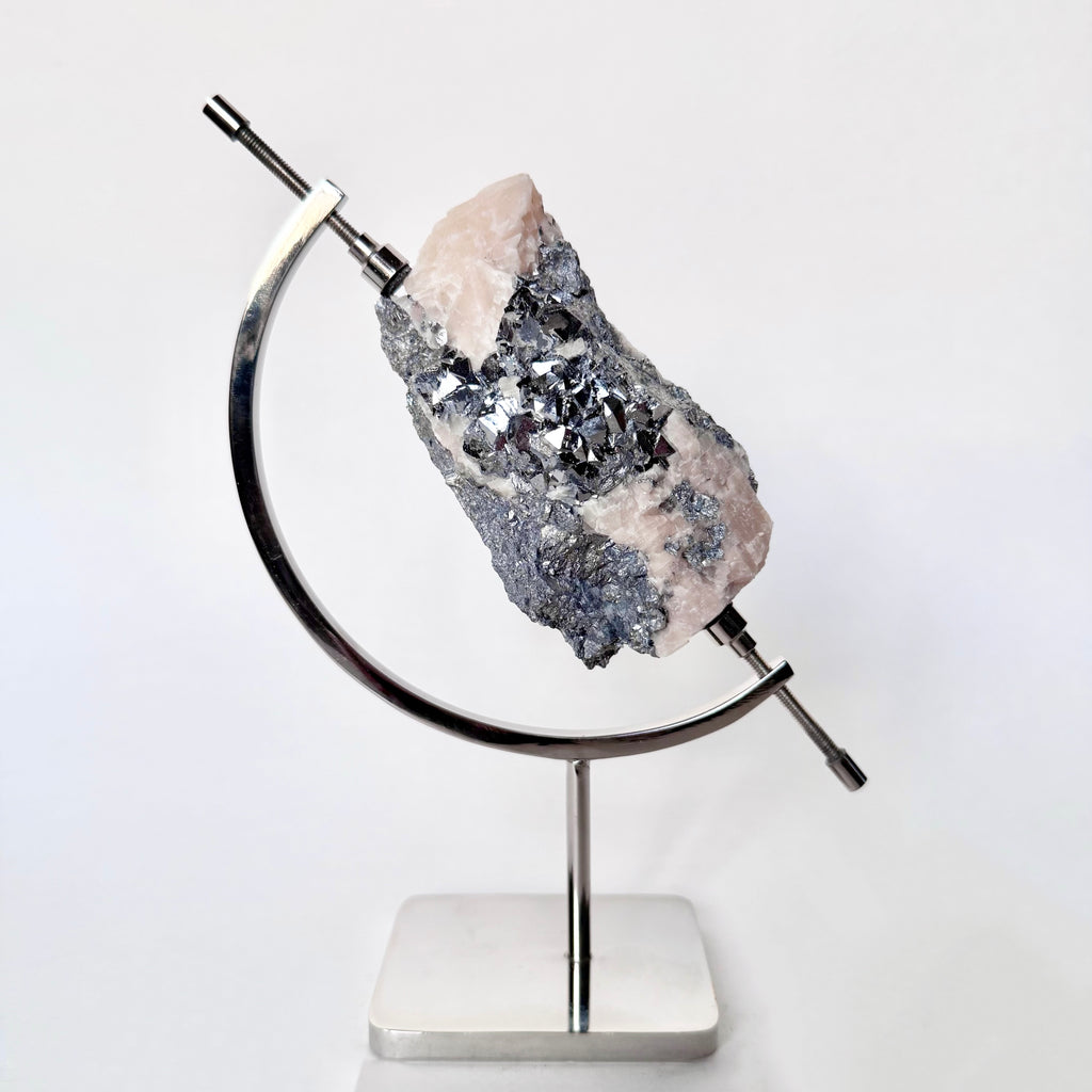 Skutterudite | Blush Calcite + Chrome Arc Stand
